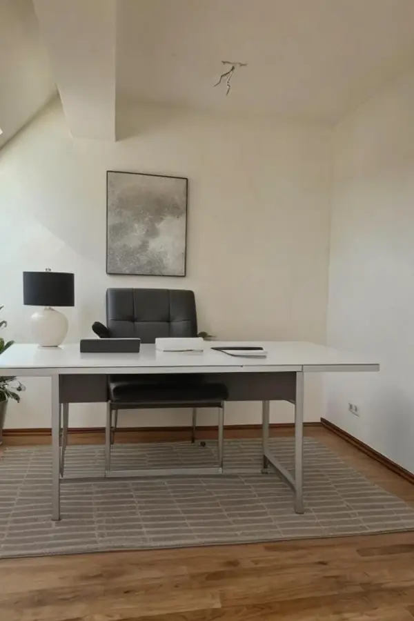 Attic room staged as a home office, as a pin