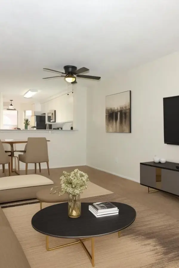 Open-plan living room staged in two zones, as a pin
