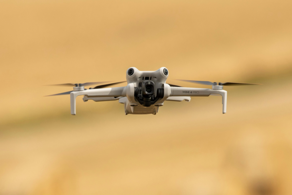 Photo of the DJI Mini 4 Pro compact drone used for aerial photography.