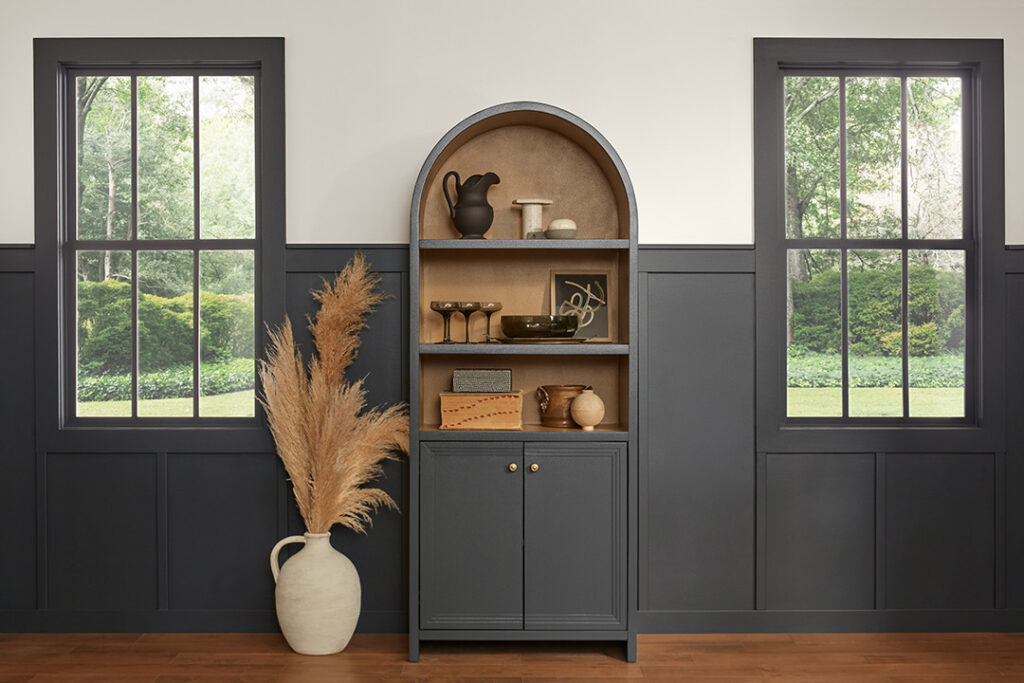 White house with black trim inspiration using Sherwin-Williams Iron Ore as a muted charcoal trim color against warm white walls